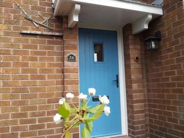 Mr & Mrs M. - HESWALL, WIRRAL. Installation of an Apeer 70 triple glazed door. Coated to a RAL colour of your choice. Dual sealed U value .7 composite doors Wirral.